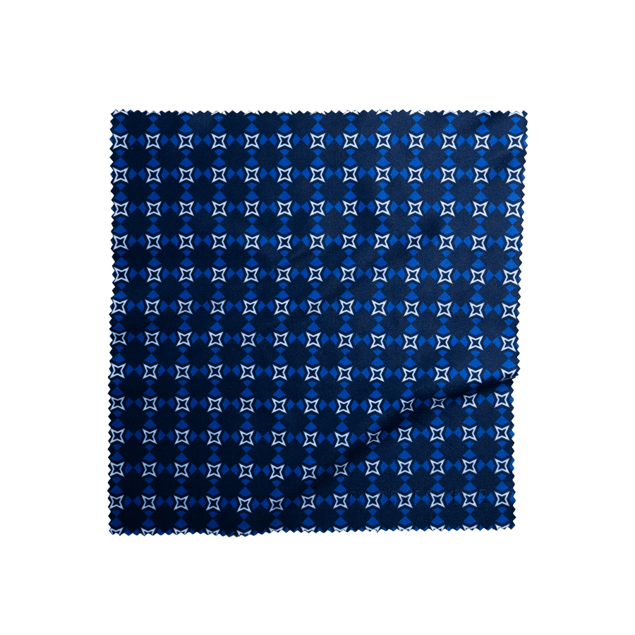 Cobalt Nova microfiber lens cloth laid flat, small white star motif on navy and Cobalt Blue