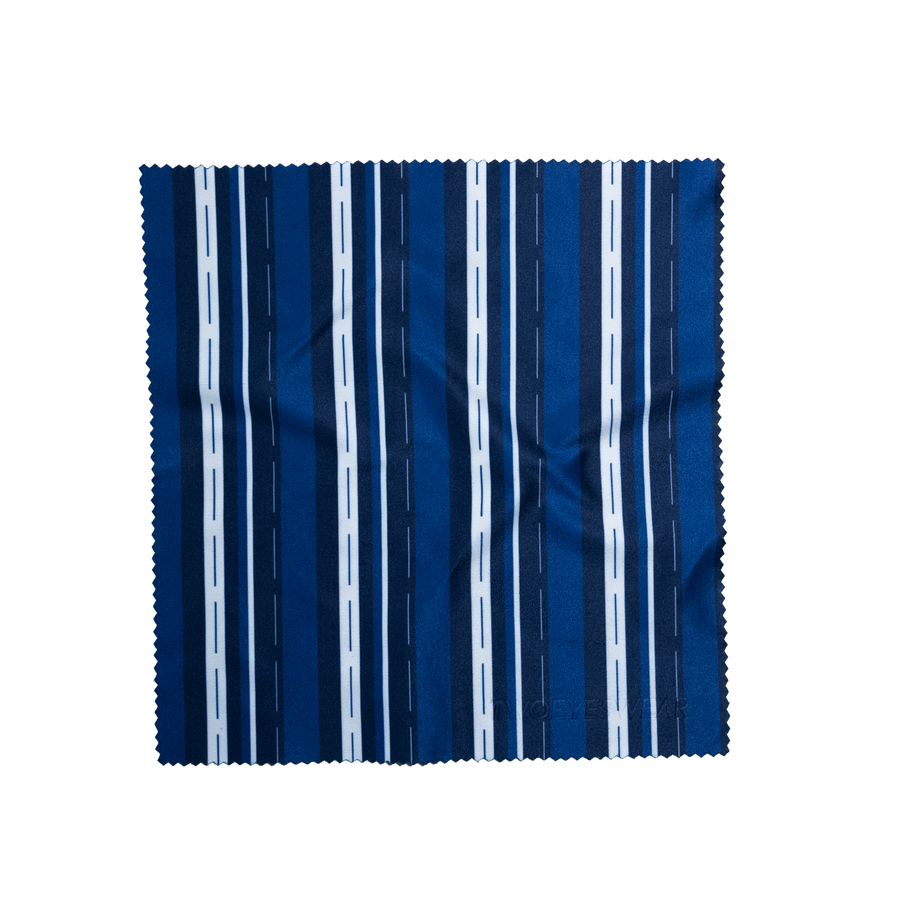 Cobalt Stripe microfiber lens cloth laid flat, vertical navy, white and Cobalt Blue stripes